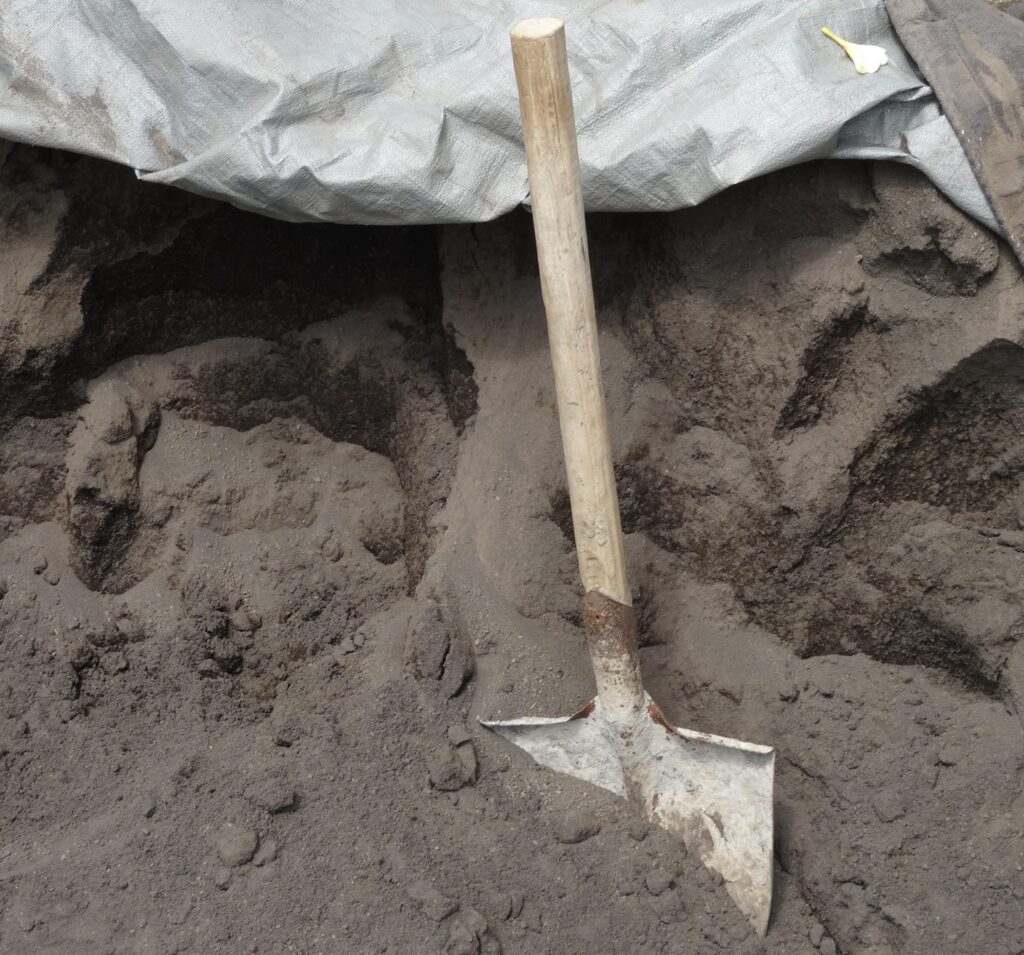 A spade - one of the tools used for concrete work